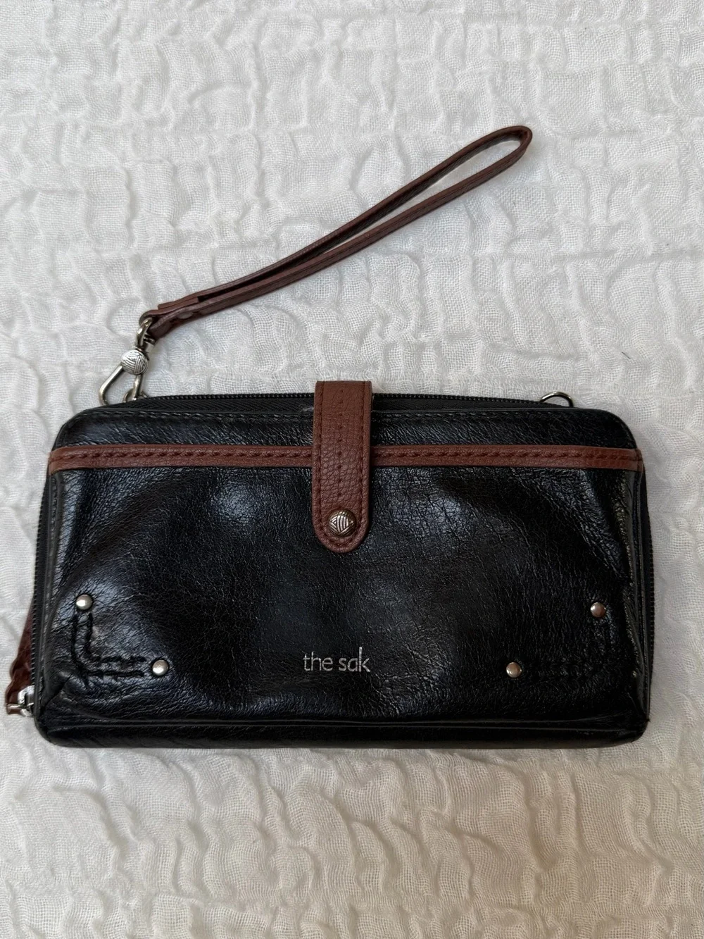 The Sak Smartphone Black and Brown Leather Wristlet